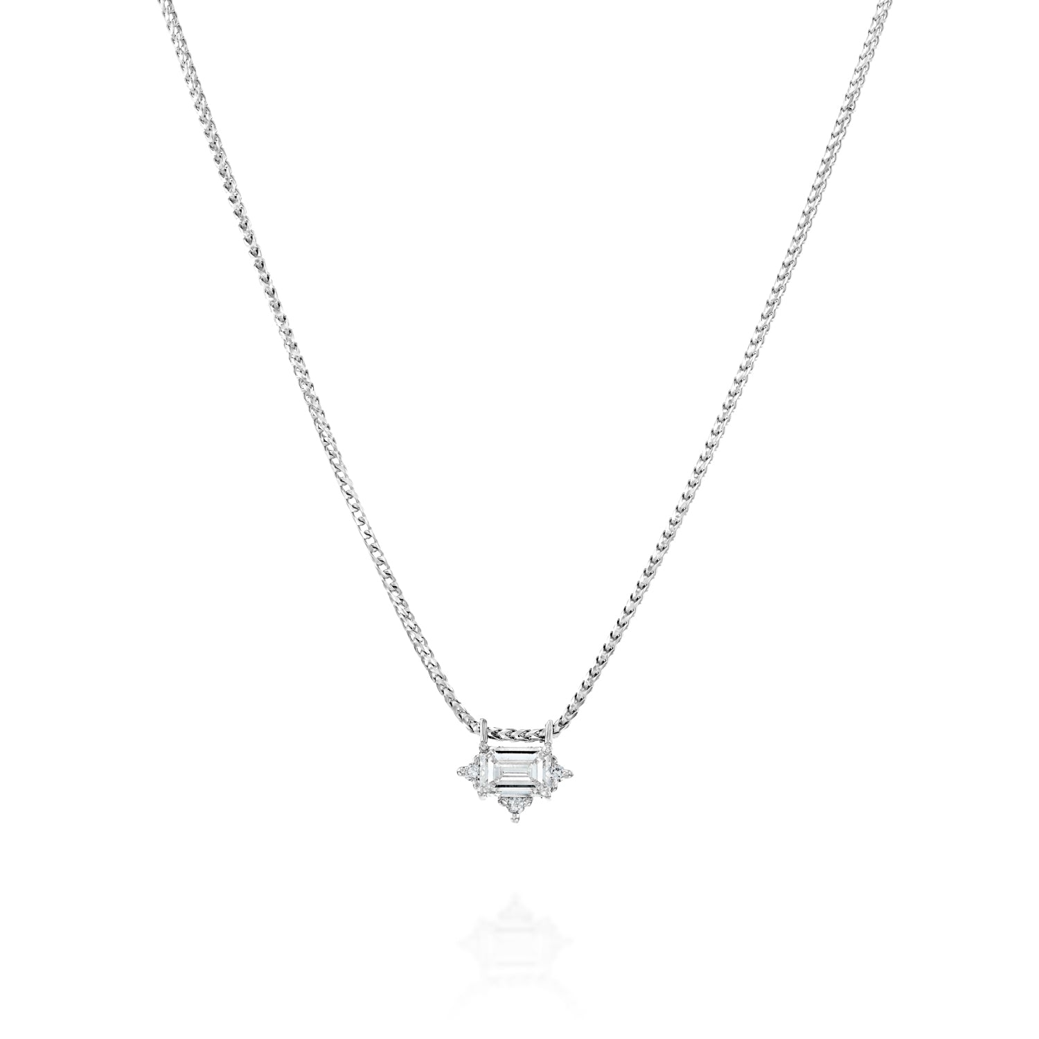 שרשרת זהב עם יהלום אמרלד ו-3 יהלומים עגולים