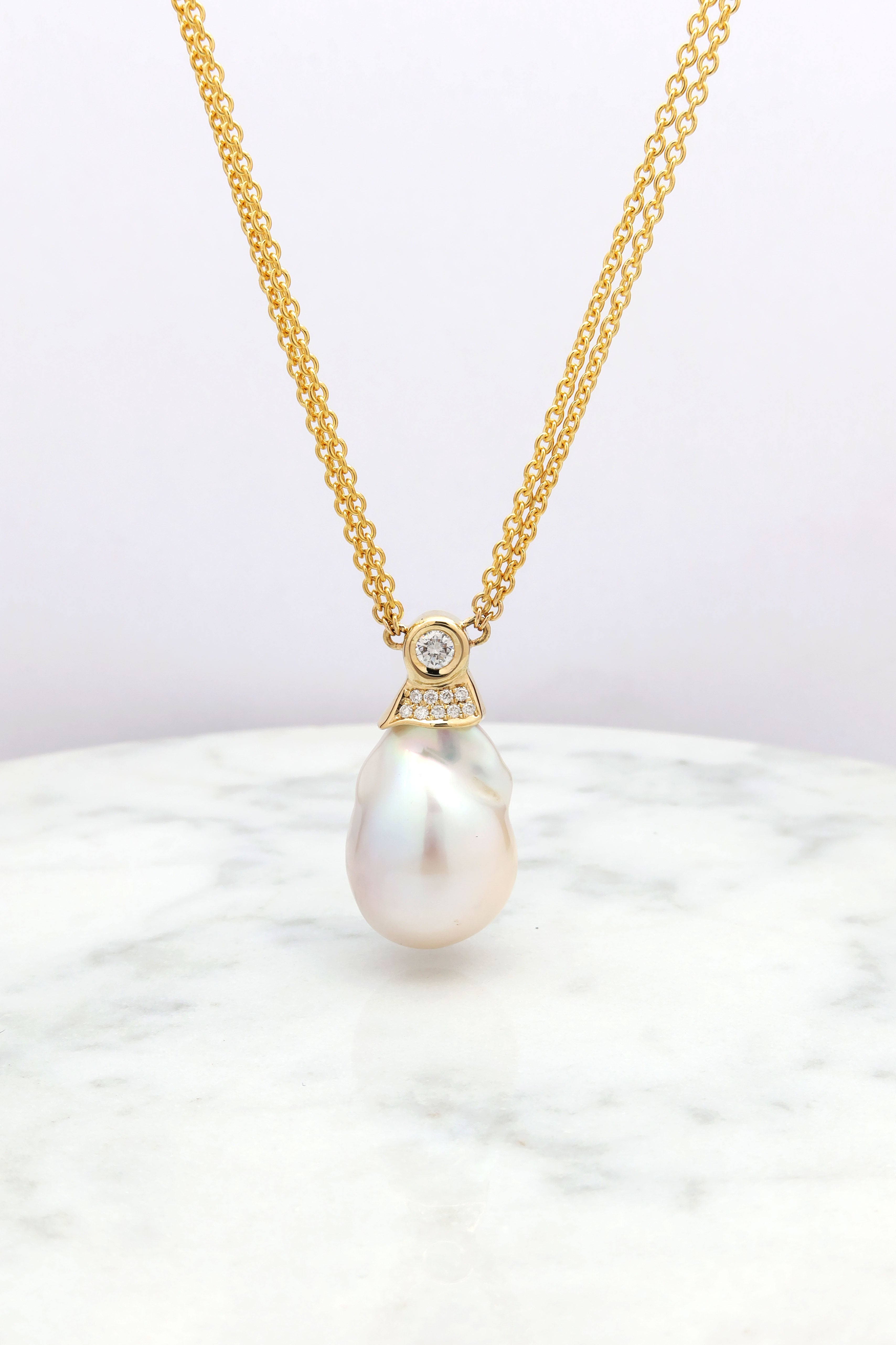 שרשרת זהב צהוב עם פנינת בארוק ויהלומים